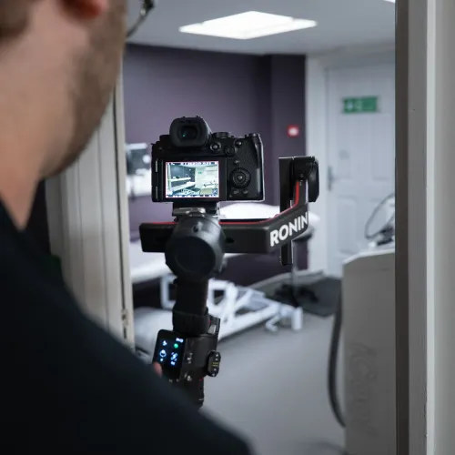 Unit Studio videographer filming on a gimbal during an on-location shoot